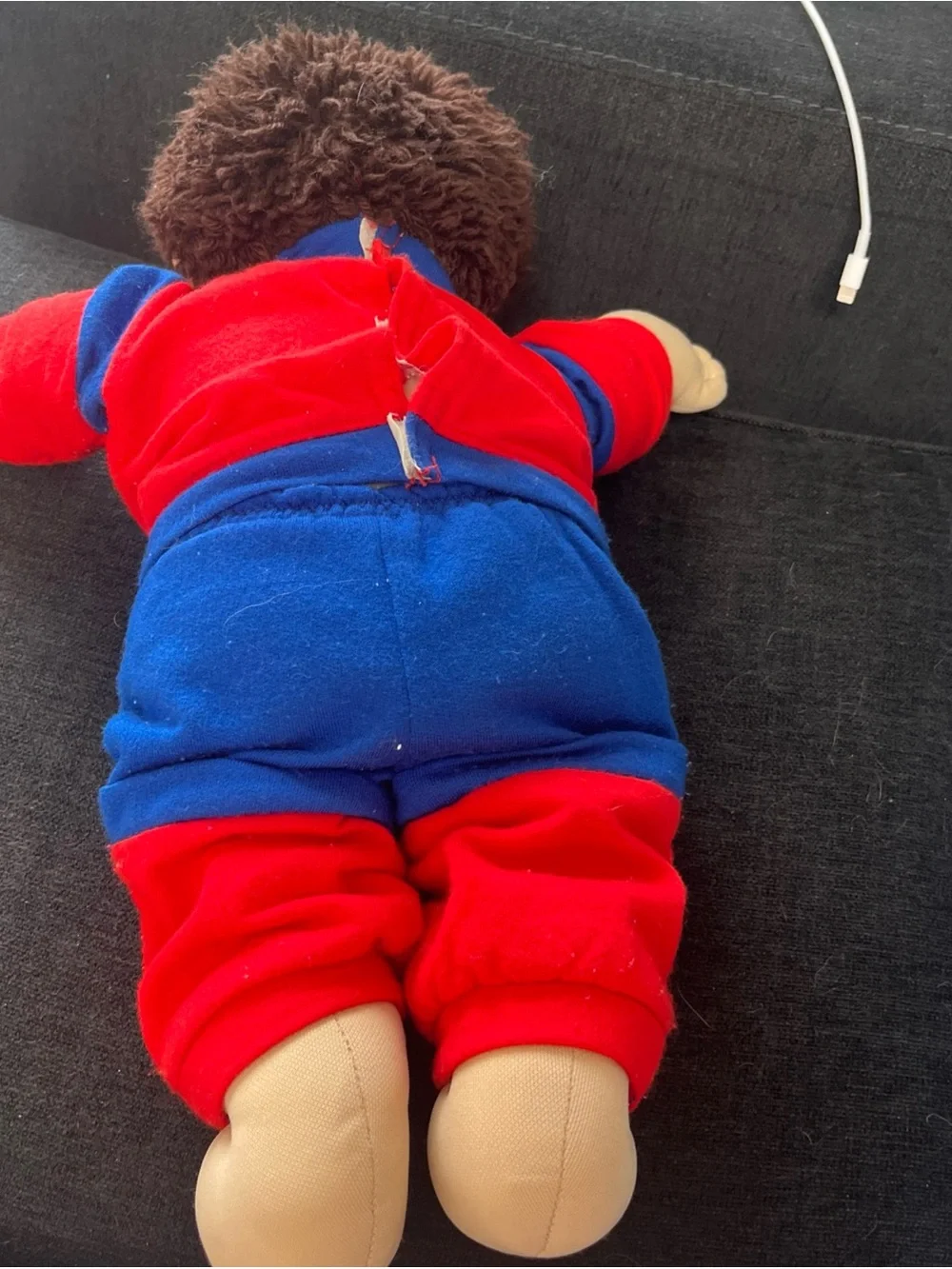 Cabbage Patch Kid with short clipped hair in sweats outfit